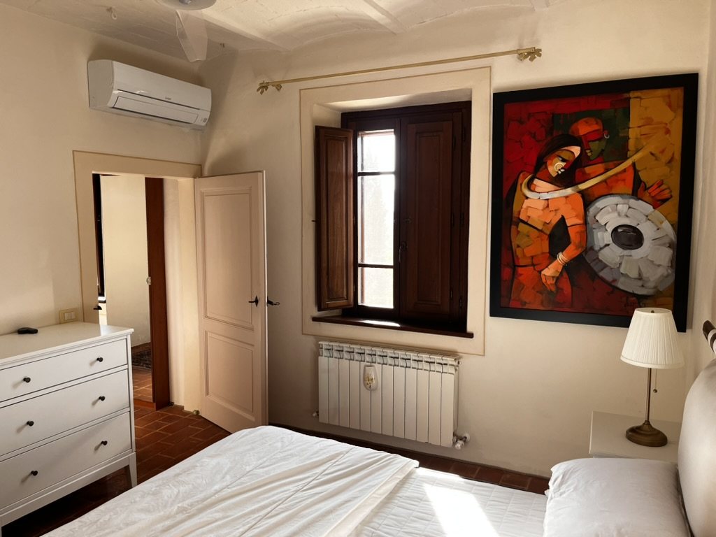 Bedroom with painting